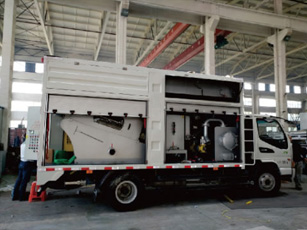 Vehicle mobile integrated dewatering unit